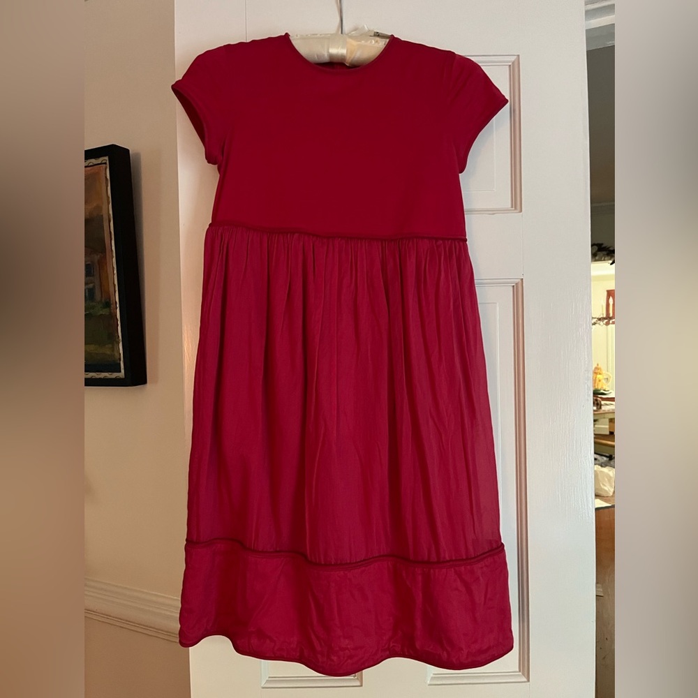 Burberry is a very pretty red cotton dress lined w/ piping accents-gently loved!